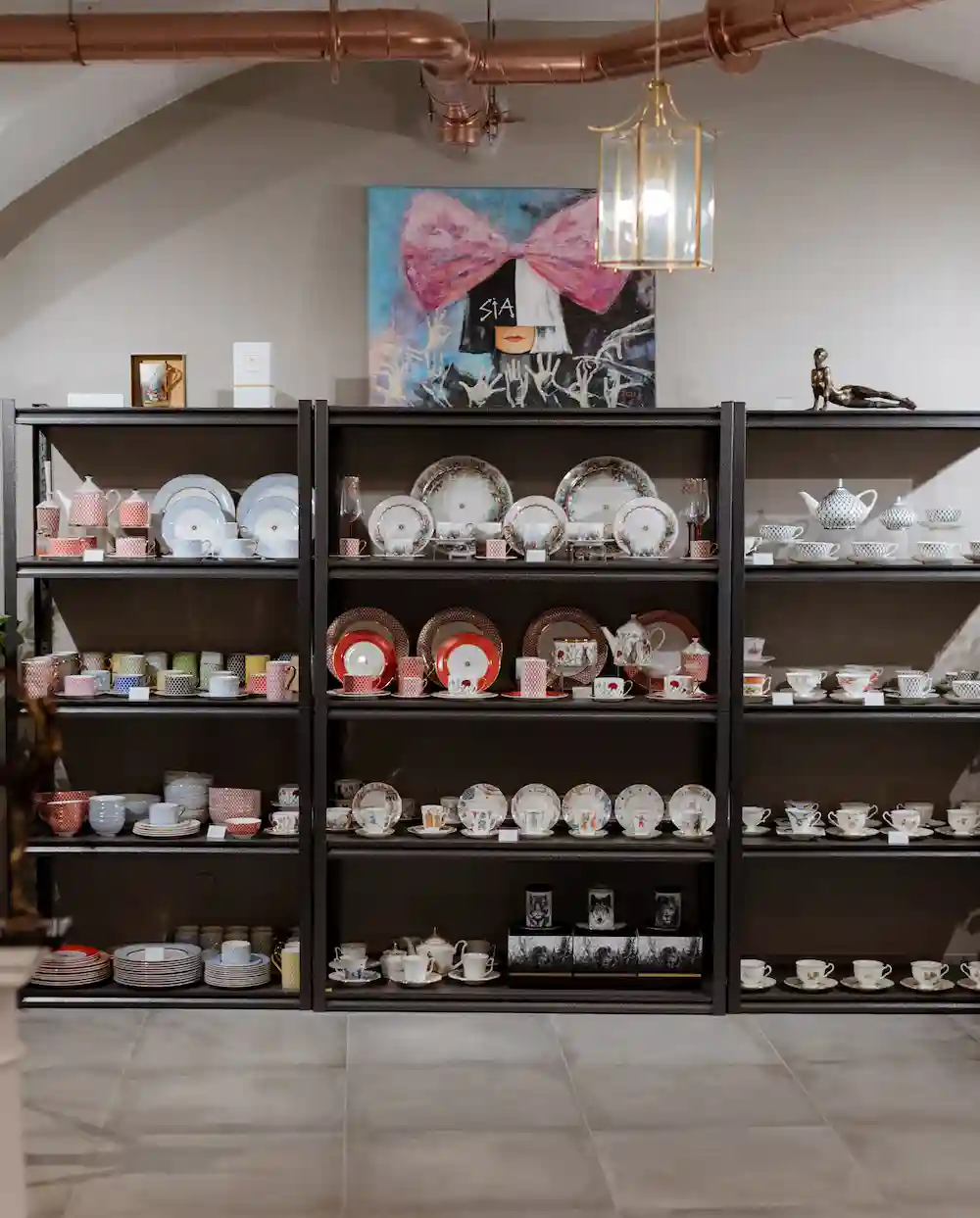 Imperial Porcelain Factory pieces on display shelves in our Tallinn store
